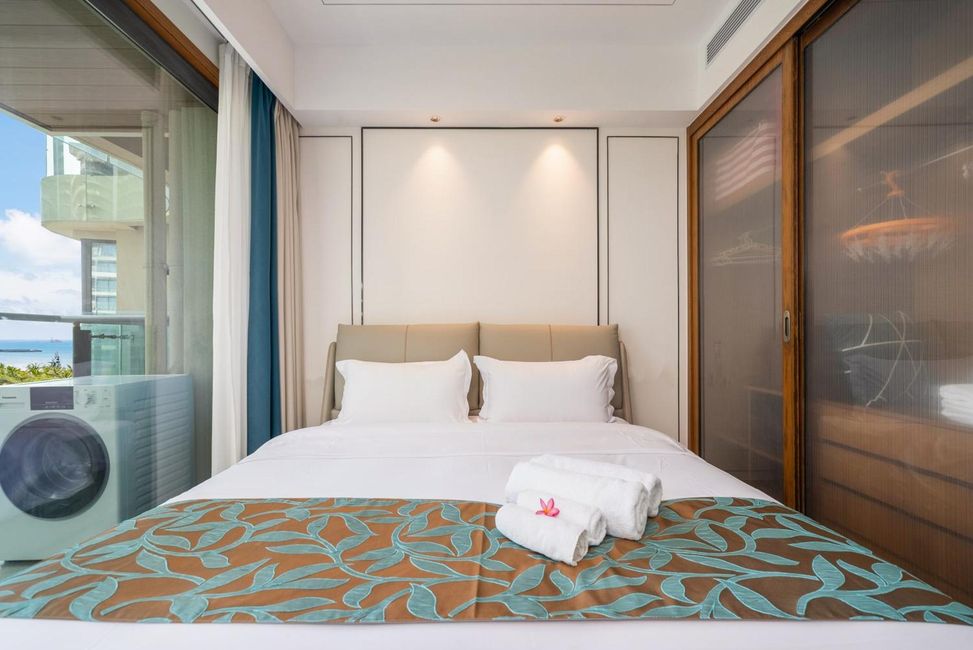 Elnob Seaview Aparthotel Hai Tang Bay Sanya Bagian luar foto