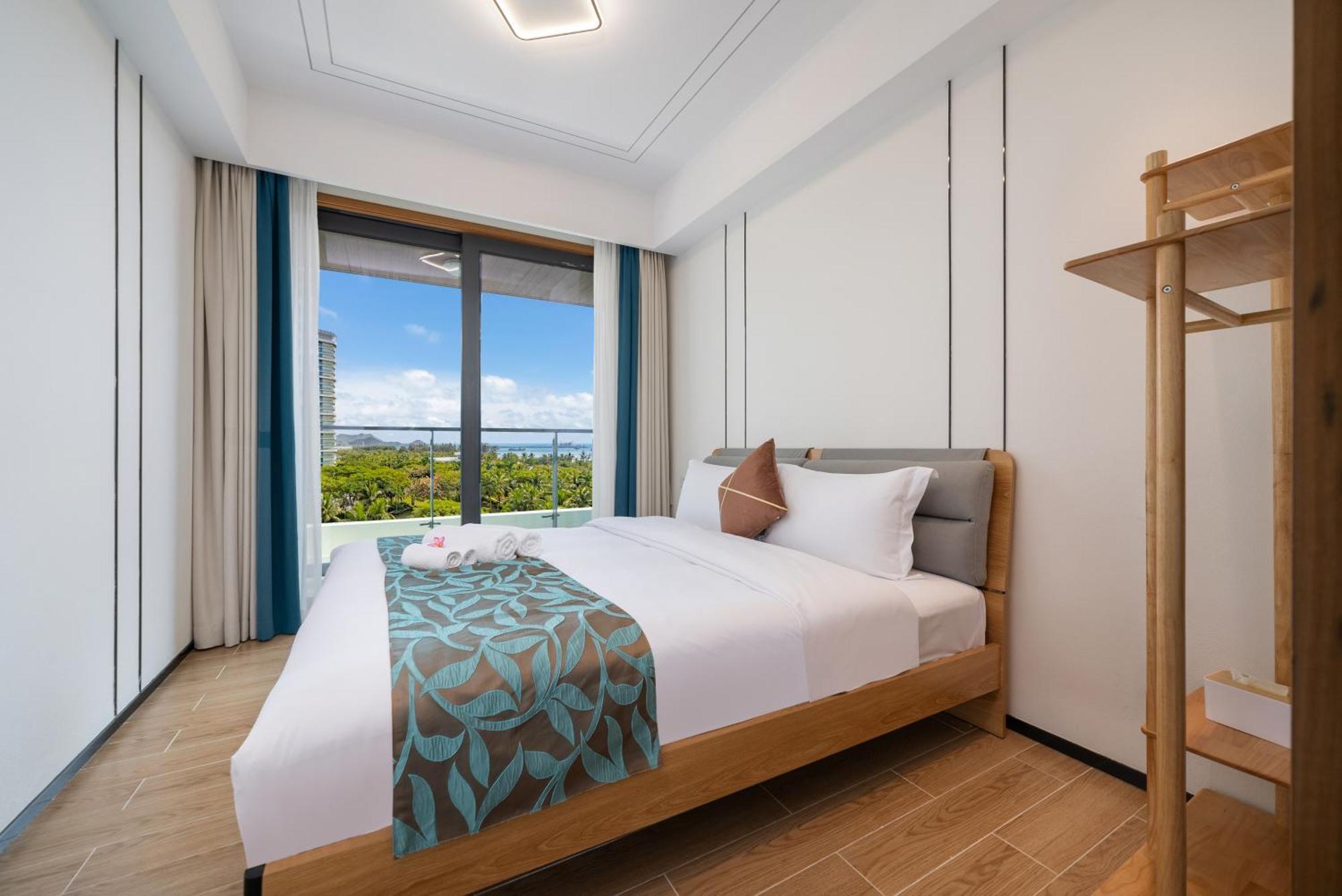 Elnob Seaview Aparthotel Hai Tang Bay Sanya Bagian luar foto