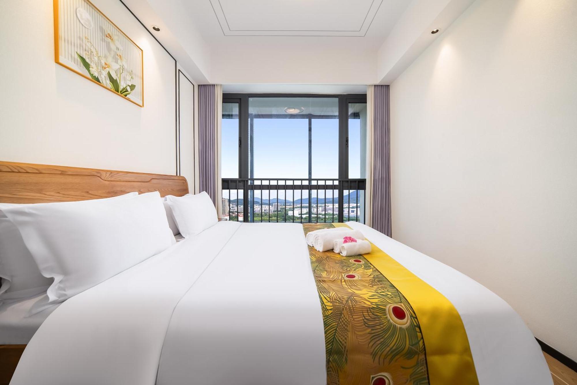 Elnob Seaview Aparthotel Hai Tang Bay Sanya Bagian luar foto